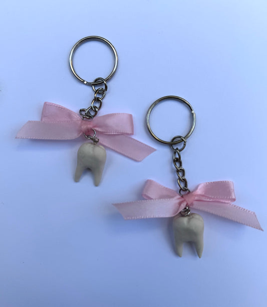 Coquette tooth keychains