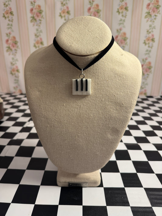 Piano key choker